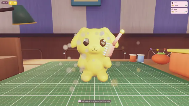A yellow plush dog on the cutting mat with sparkles around it